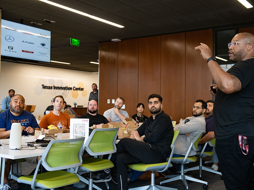 graduate students participating in Torq demo